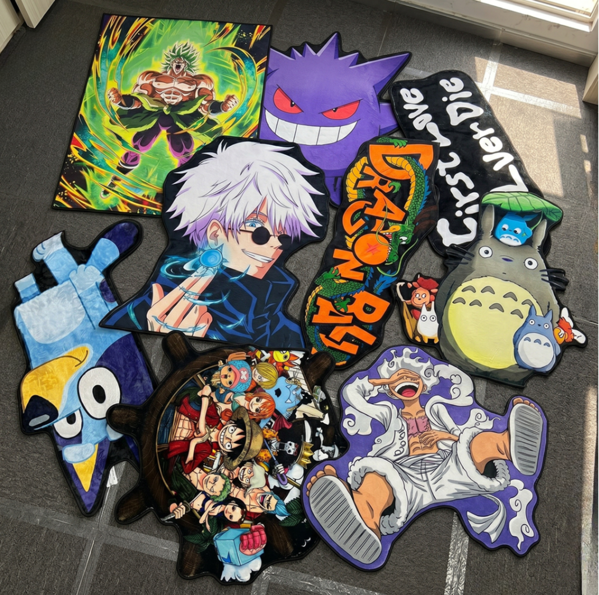 A colorful collection of anime-inspired character floor mats